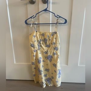 small yellow mini dress with floral detail